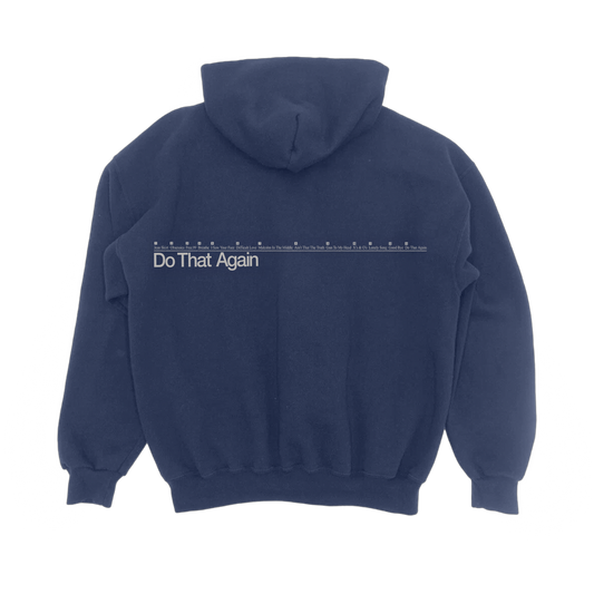 Navy hoodie with a 'Do That Again' line design printed across the back