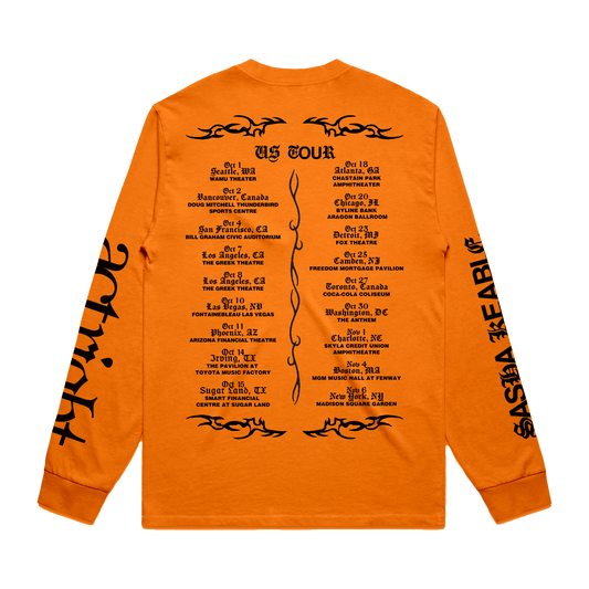 Orange Sasha Keable long-sleeve shirt with black US tour dates on back.