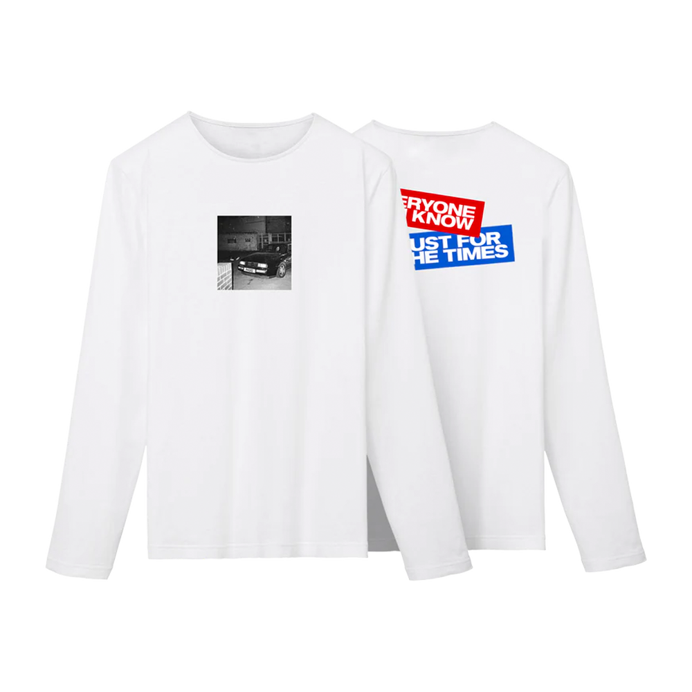 Front and back view of a white unisex regular fit long-sleeve T-shirt with a black photo print on the chest and a red and blue block text print on the back reading 'Everyone You Know – Just for the Times'.