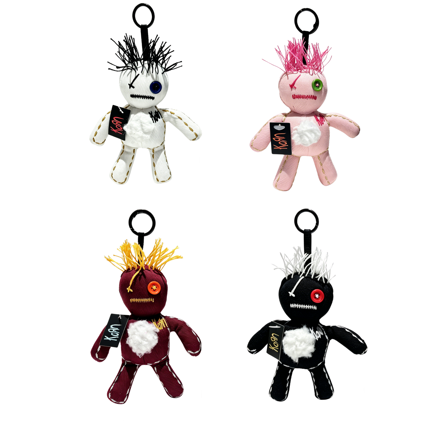 Four Korn doll keychains with different colors and designs