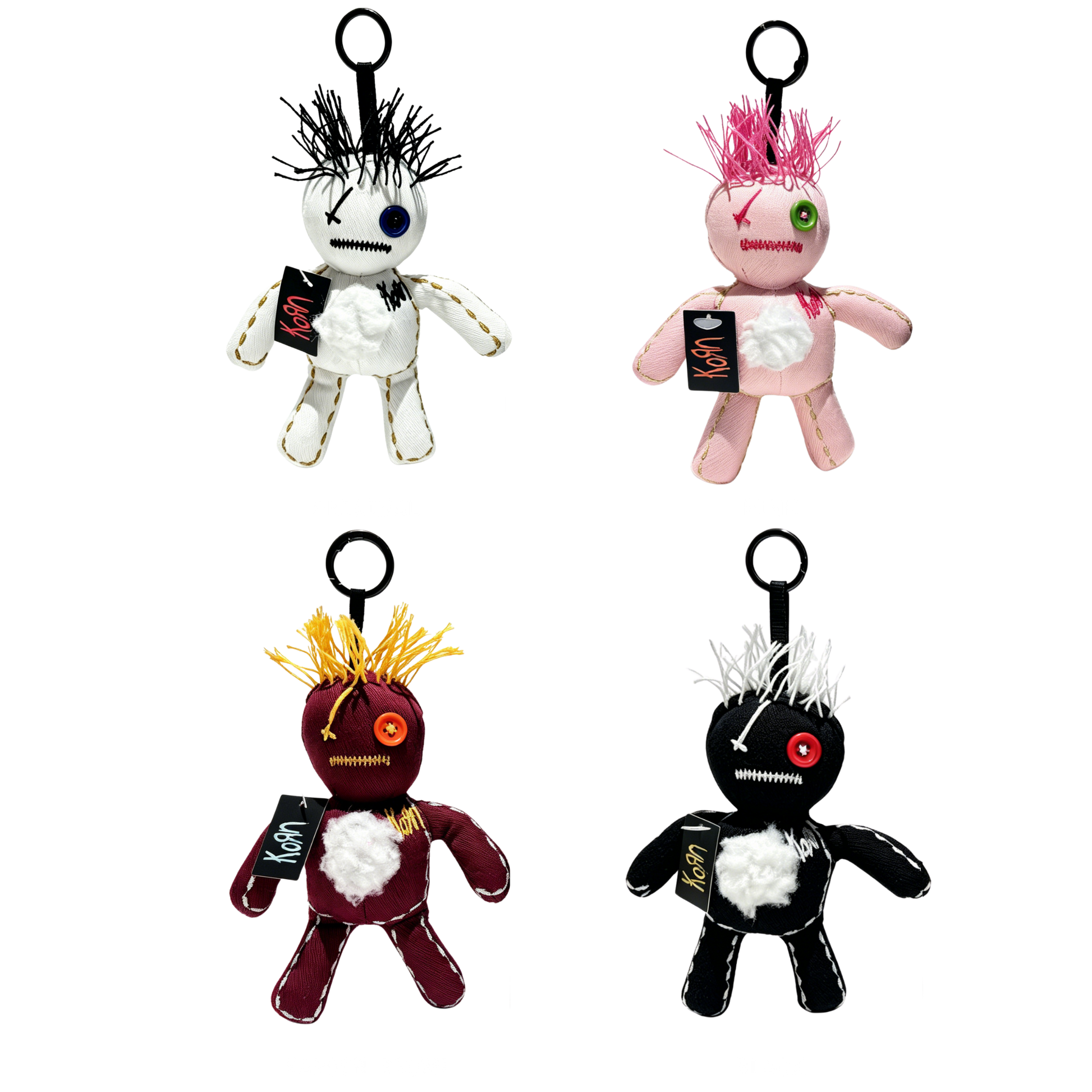 Four Korn doll keychains with different colors and designs