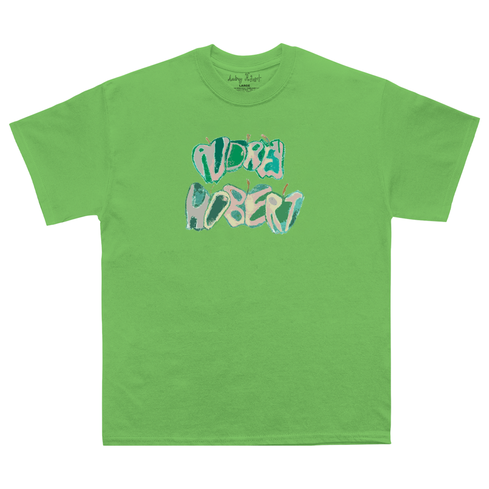 A bright green crewneck t-shirt featuring a stylized graphic print of the text 'AUDREYHOBERT' in a bubbly, layered font with teal, light blue, and pink colors, displayed on a clean white background.