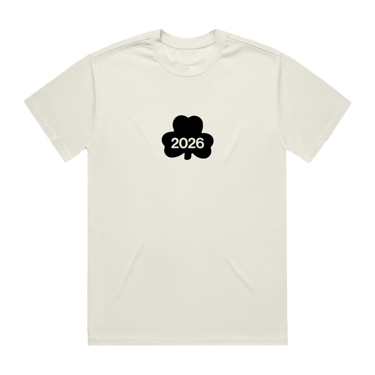 Aaron Rowe bone colored t-shirt with a black clover design featuring '2026'.