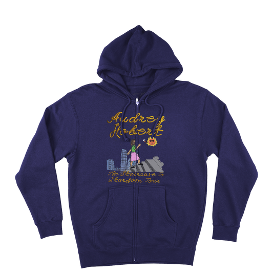 Front view of a navy blue zip-up hoodie with Audrey Hobert graphic print across the front. 