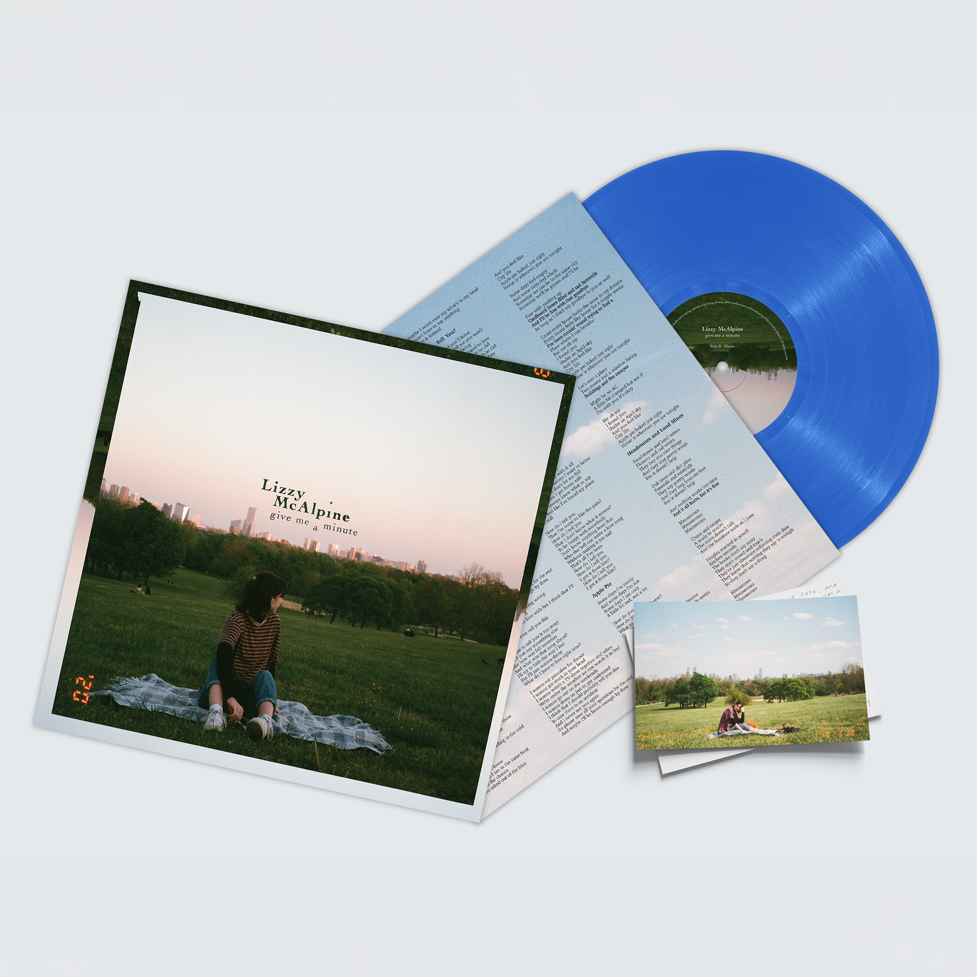 Front view of Lizzy McAlpine Give Me A Minute - 5 year anniversary - Blue Vinyl LP