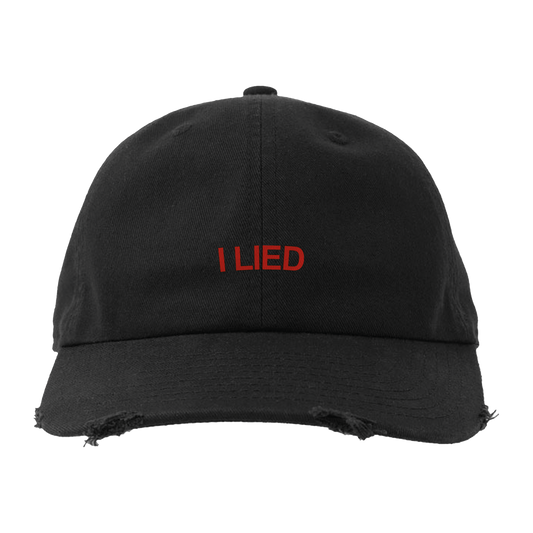 Black cap with 'I LIED' in red text across the front