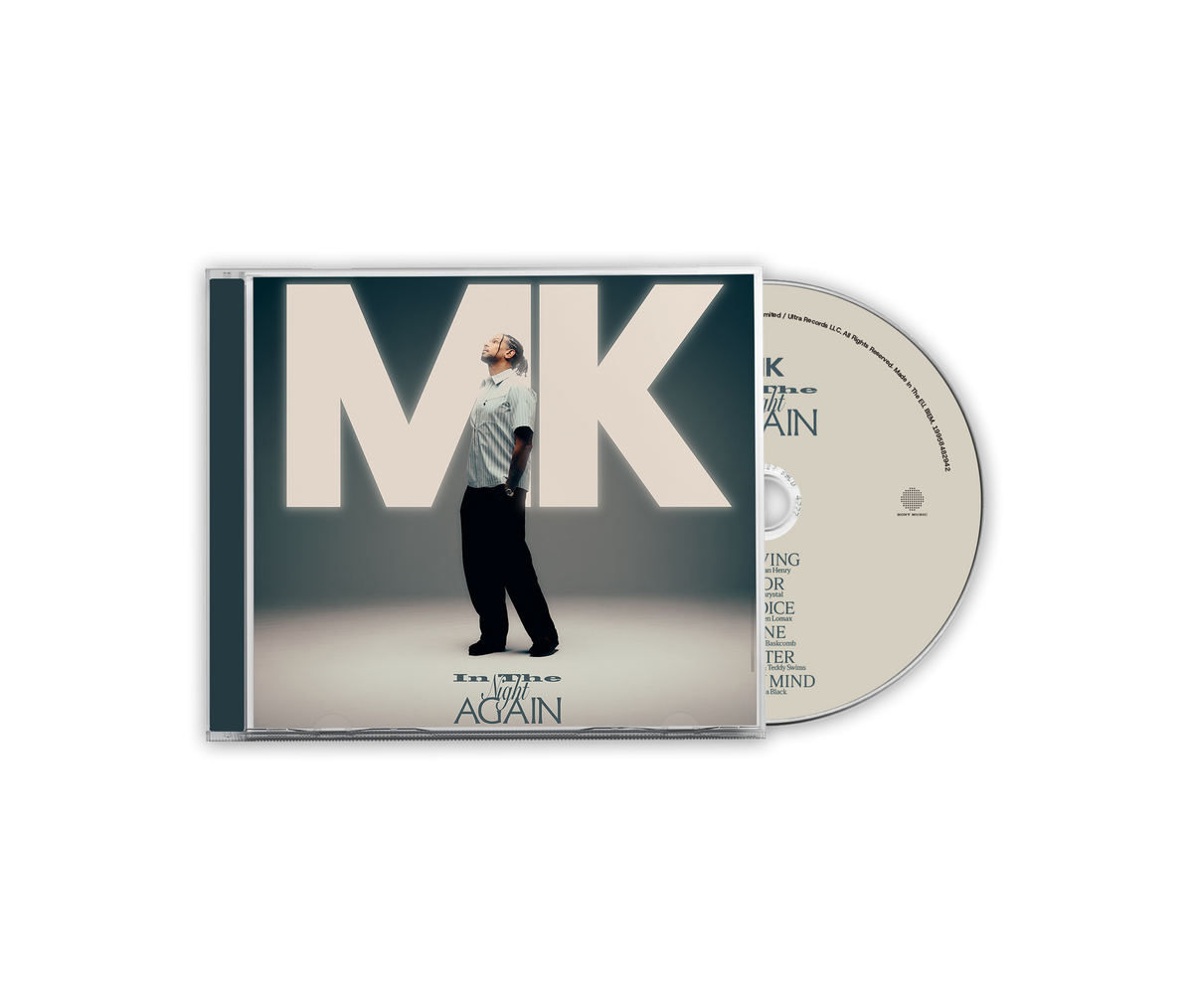 MK - In The Night Again - CD. 
A CD album case with the cover partially slid off, revealing the disc behind it.