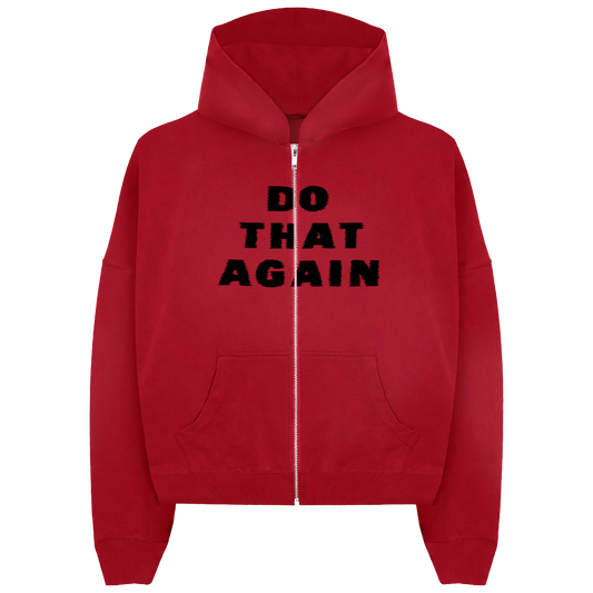 Red zip-up hoodie with black 'Do That Again' print across the front