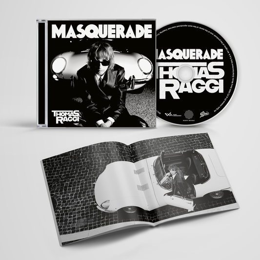 Album packaging for 'Masquerade' by Thomas Raggi with cover, CD, and booklet.