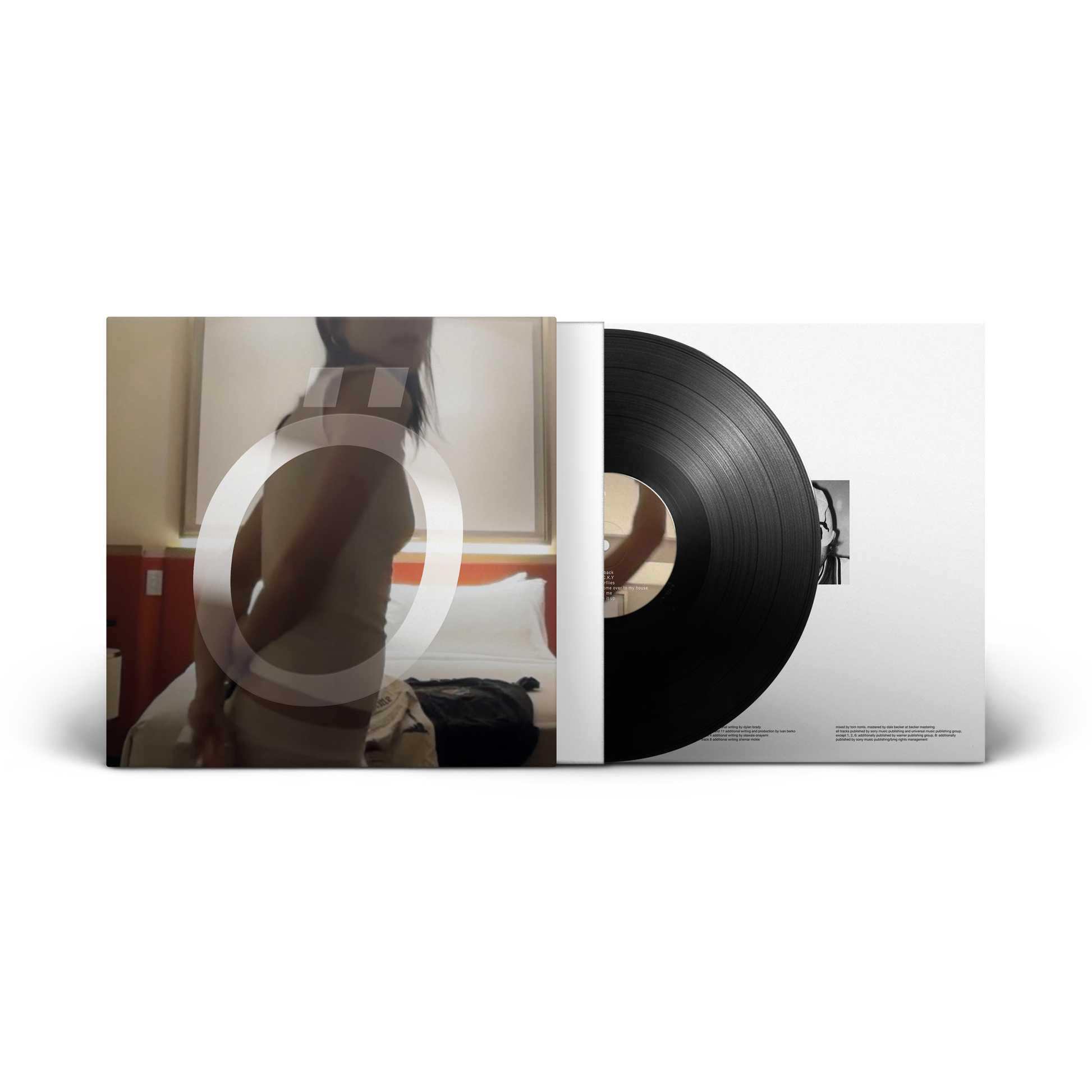 Vinyl record and cover with a room interior in the background