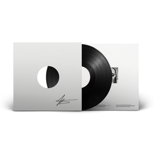 Vinyl record with a white sleeve