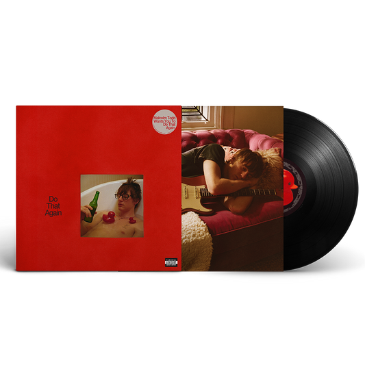 Malcolm Todd – Do That Again standard black vinyl record partially pulled from its sleeve, with a portion of the printed insert visible.